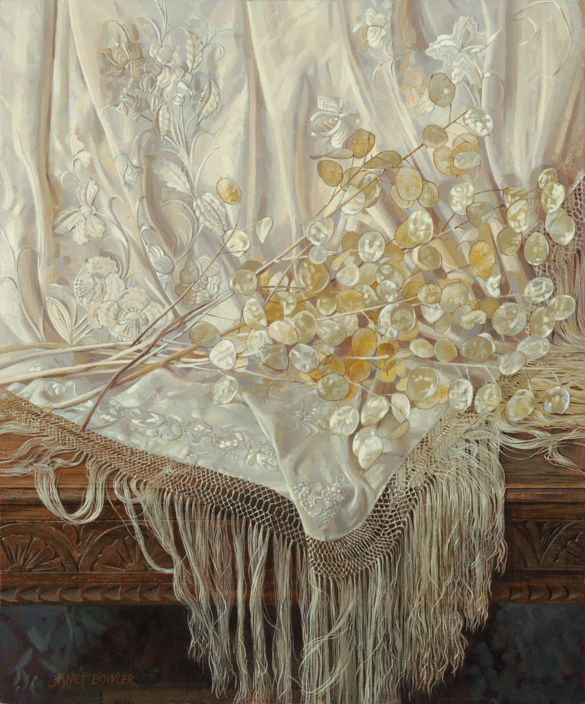 Still-life of an antique silk shawl and Honesty seed-heads