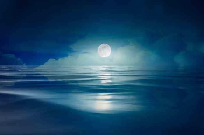 "Full moon on the sea at night" Photo by Sarayut Thaneerat